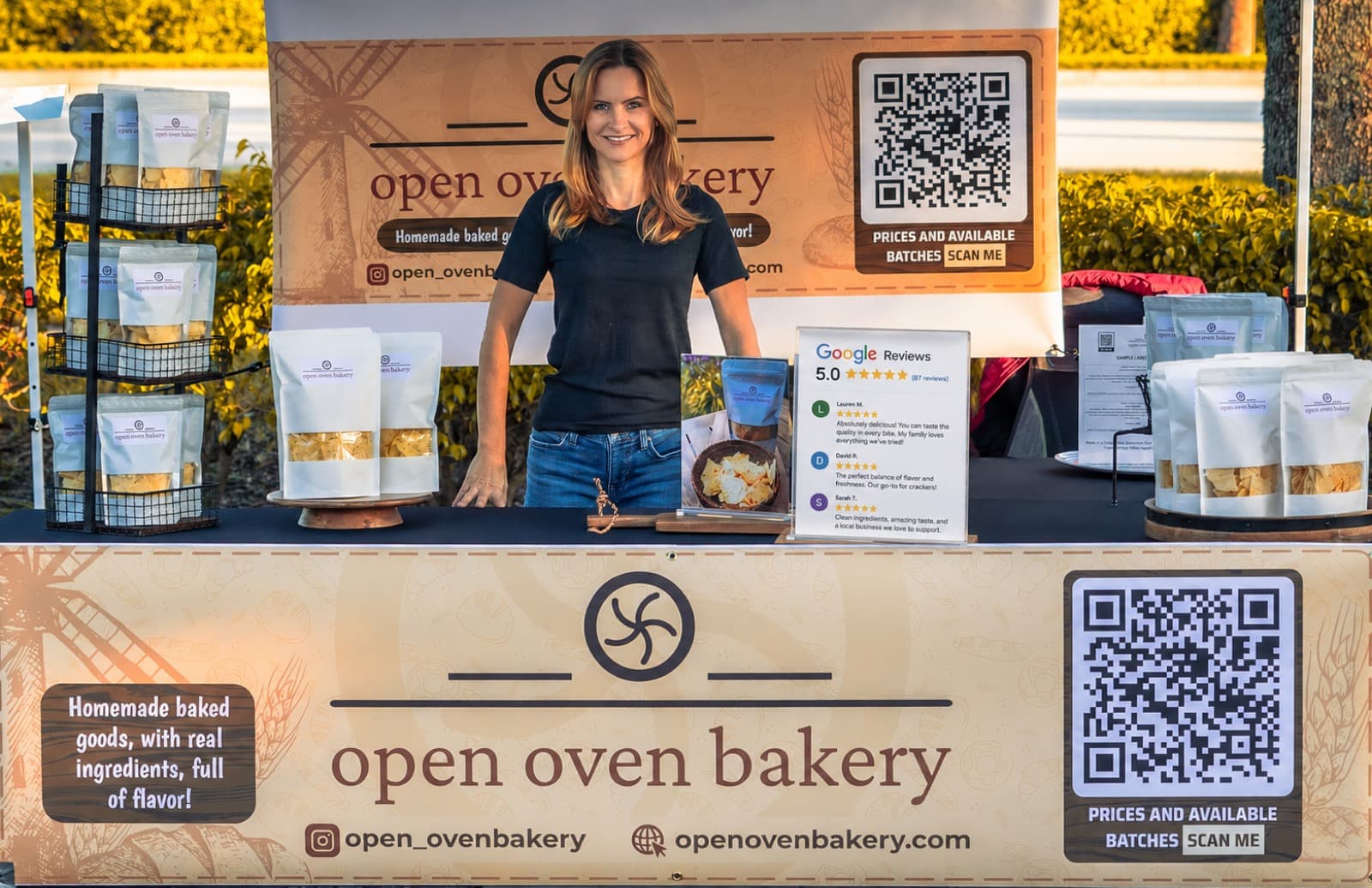 Naiara Cervo behind the Open Oven Bakery stand at a South Florida farmers market